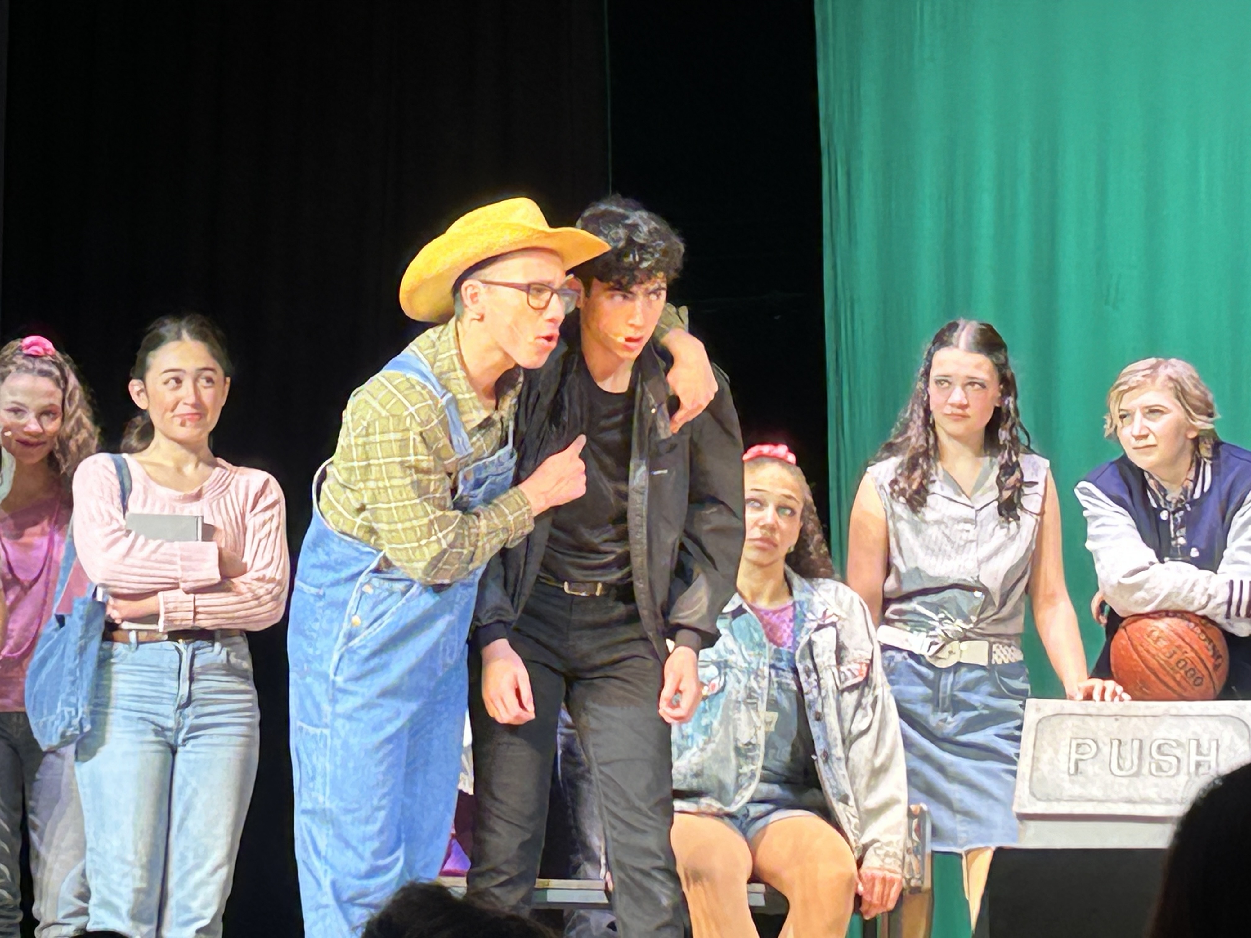 Julian performing in Footloose